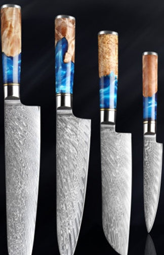 Set of knives with decorative handles on a black background