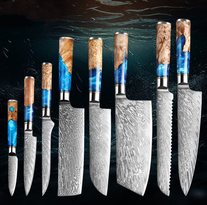 Set of knives with wooden handles and blue accents on a dark background