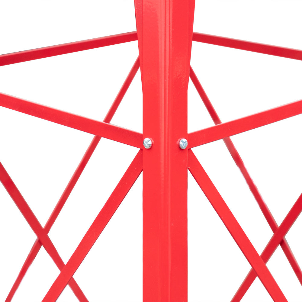 Close-up of a red metal wheel with spokes on a white background