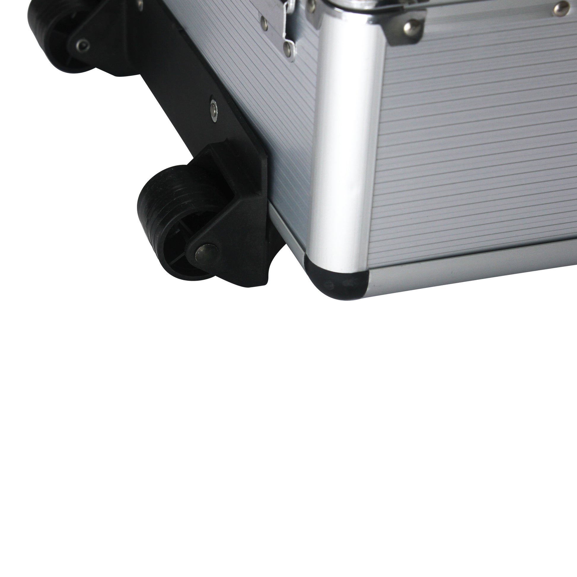 Close-up of a silver suitcase with a black wheel on a white background