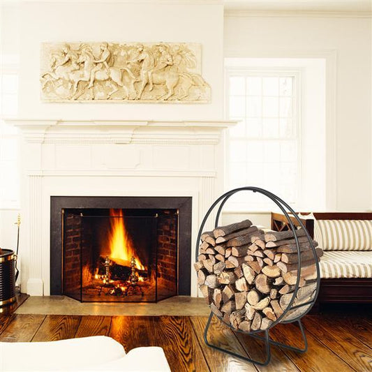 Fireplace with a fire burning and a metal log holder filled with wood in a living room.