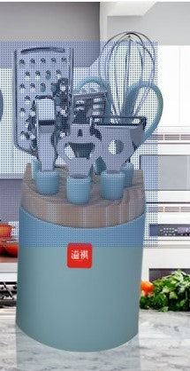 Set of kitchen utensils in a blue holder with a brand logo on a blurred kitchen background.