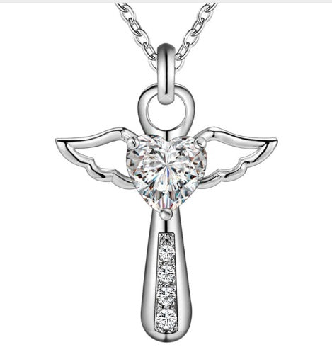 Silver angel pendant necklace with clear gemstone on a white background