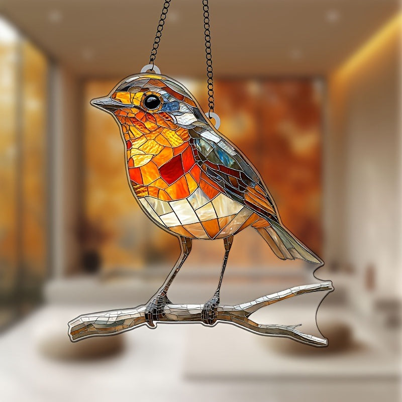 Stained glass bird sculpture on a branch with a blurred background