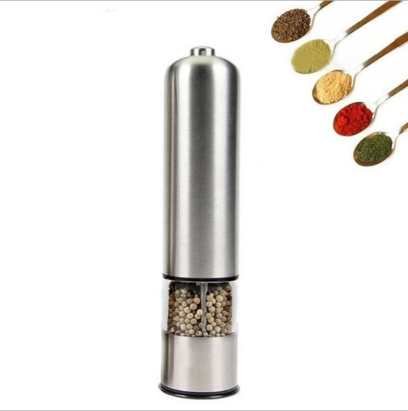Stainless steel pepper mill with a small inset showing spices in spoons.