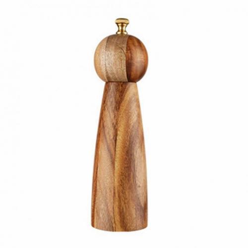Wooden pepper grinder with gold top on a white background