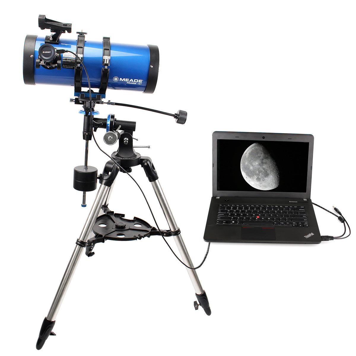 Telescope on a tripod with a laptop displaying a moon image on a white background