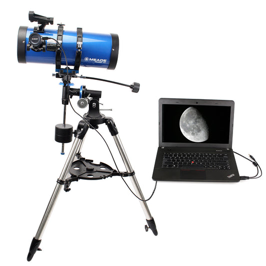 Telescope on a tripod with a laptop displaying a moon image on a white background