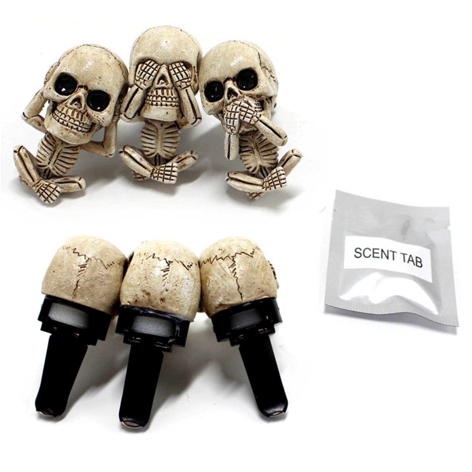 Three skeleton-themed air freshener refills with a scent tab on a white background
