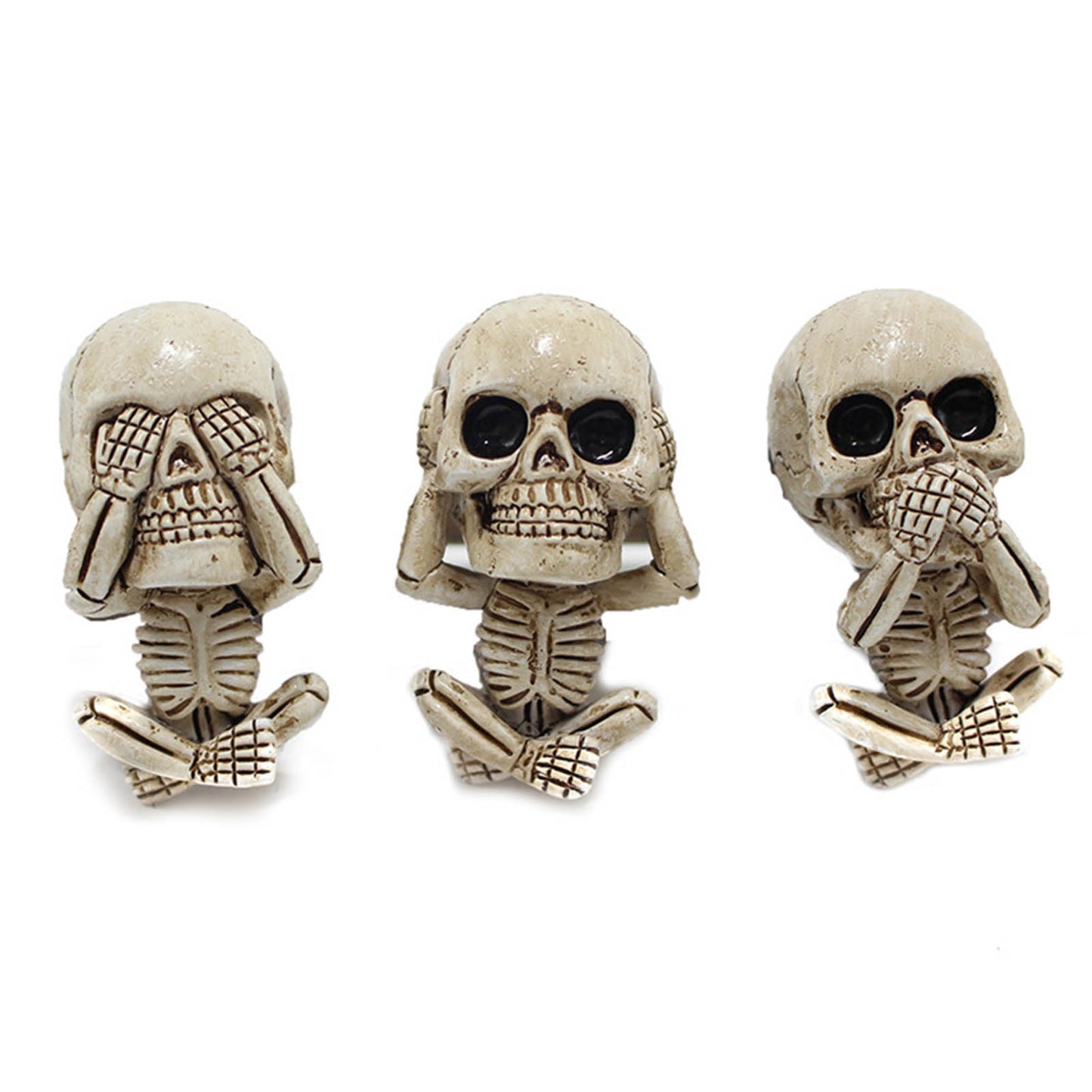 Three skull-shaped buttons with different gestures on a white background