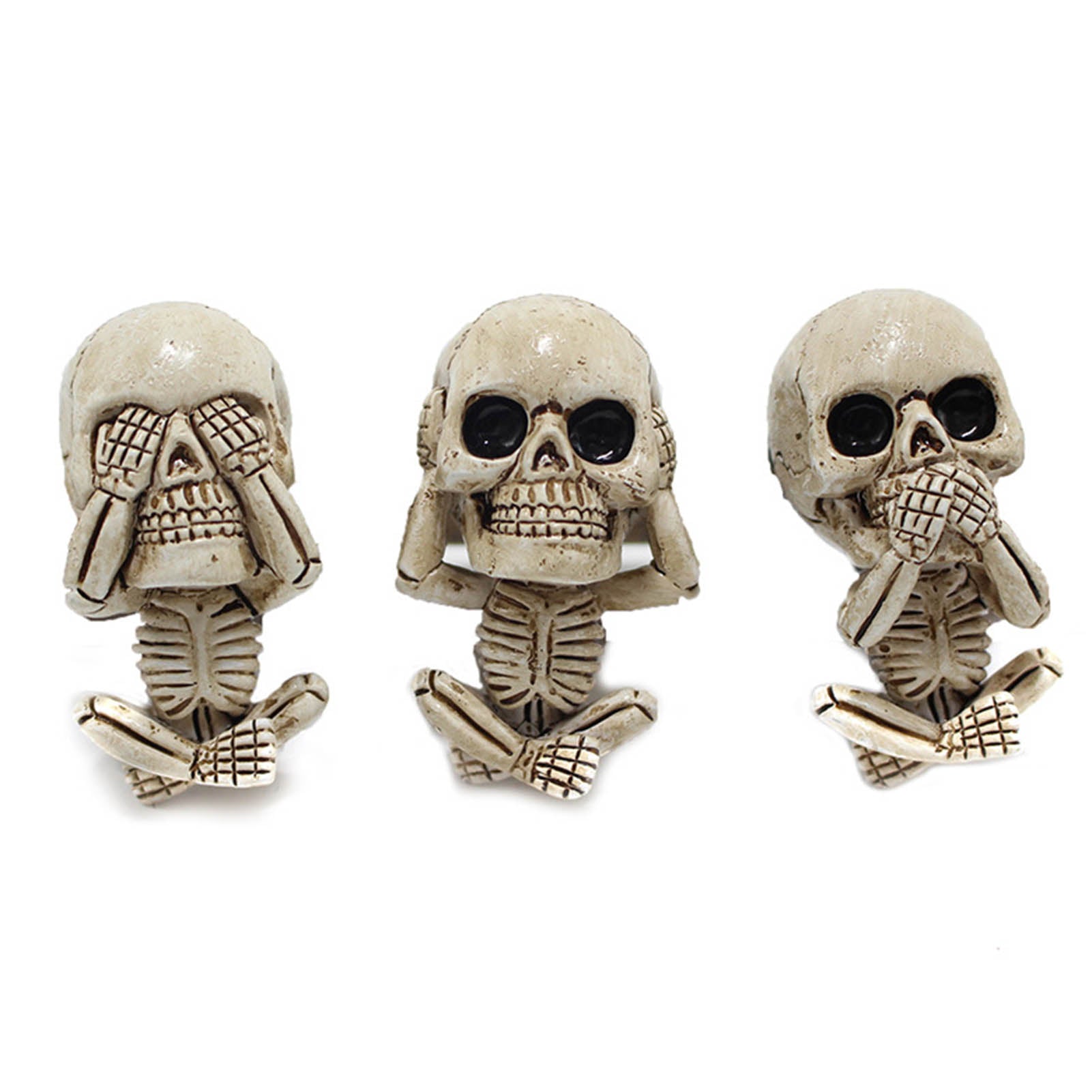 Three skull-shaped buttons with different gestures on a white background