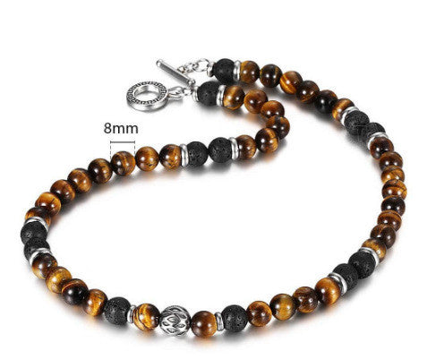 Necklace with brown and black beaded design on a white background