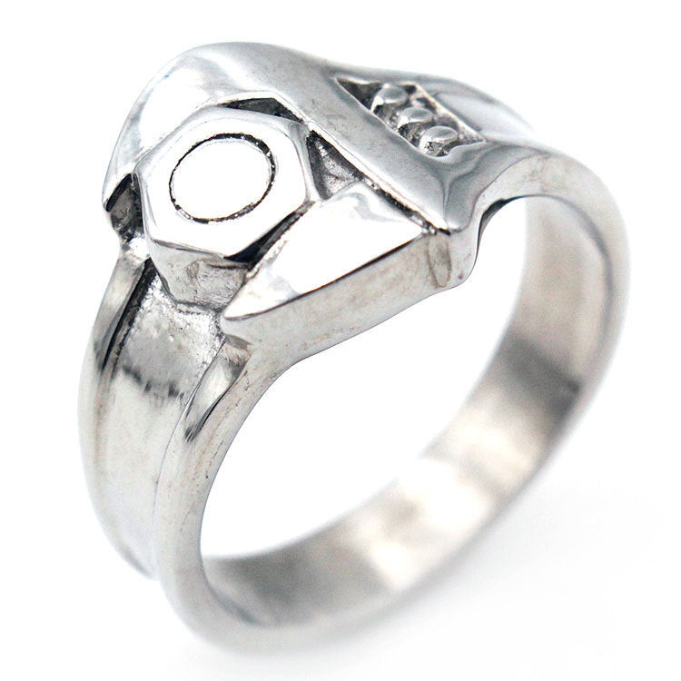Silver ring with geometric design on a white background