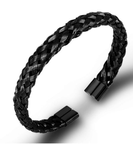 Black braided bracelet on a white background