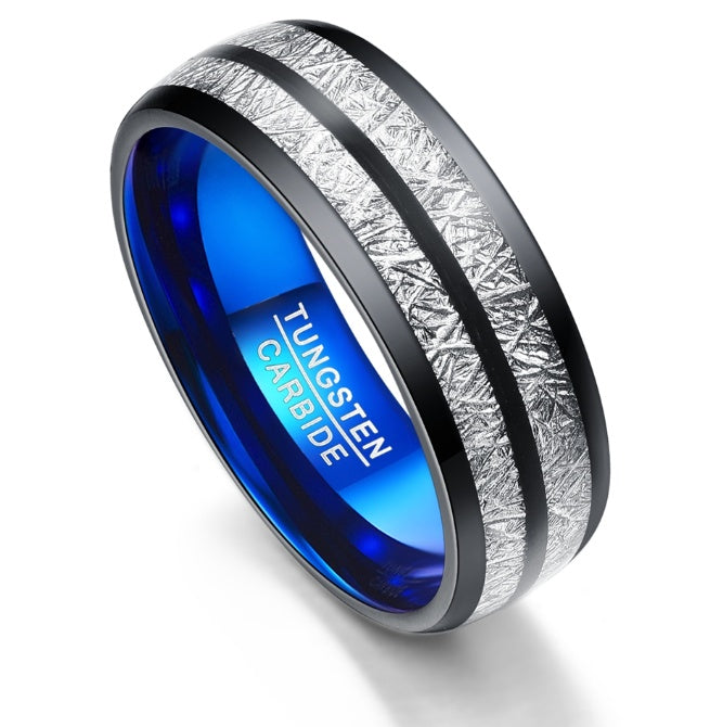 Tungsten carbide ring with blue interior and textured exterior on a white background