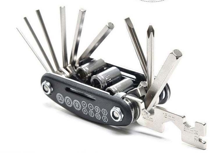 Multitool with various tools on a white background