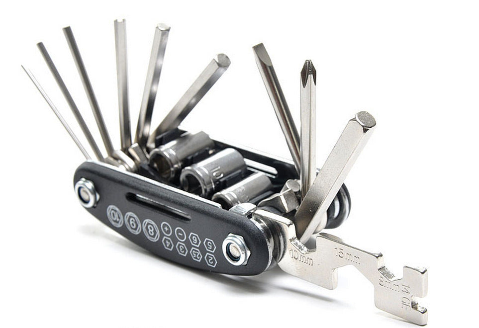 Multitool with various tools on a white background