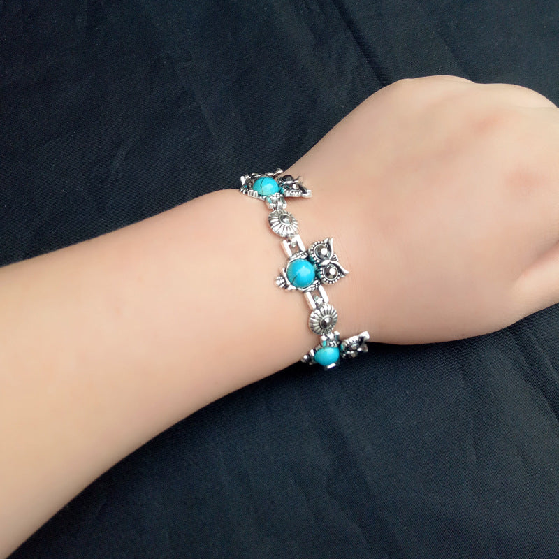 Vintage Turquoise Owl Bracelet on a wrist