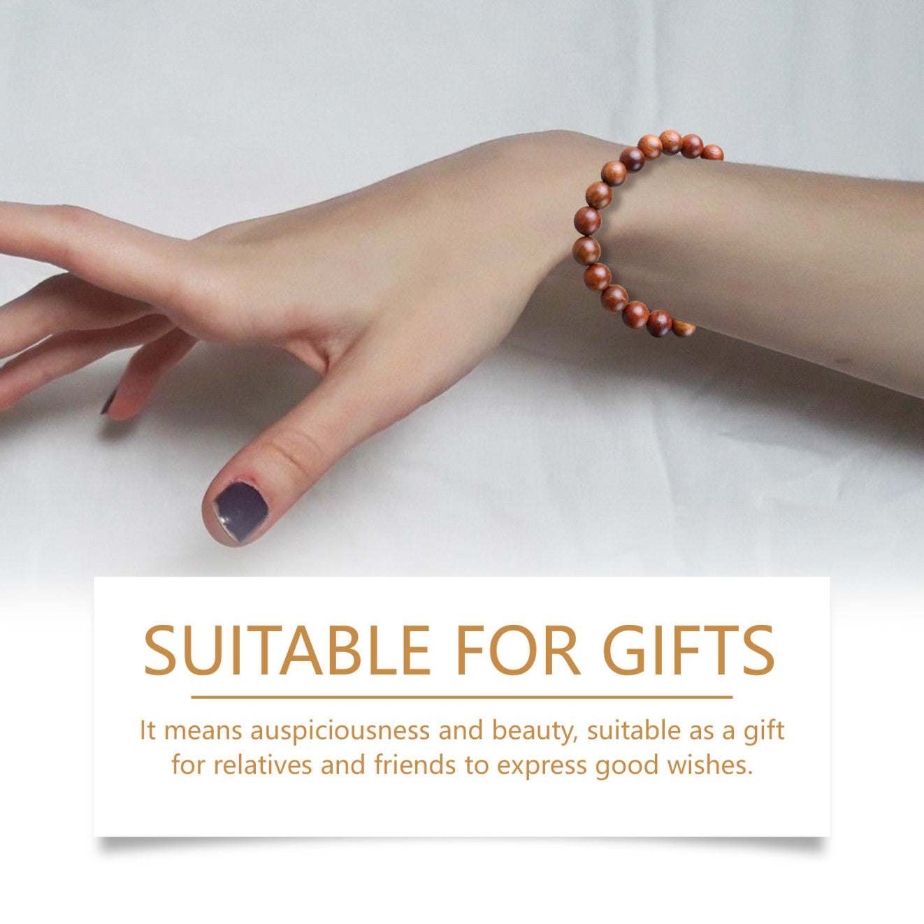 Hand wearing a brown beaded bracelet on a white background with text about the bracelet's symbolism.