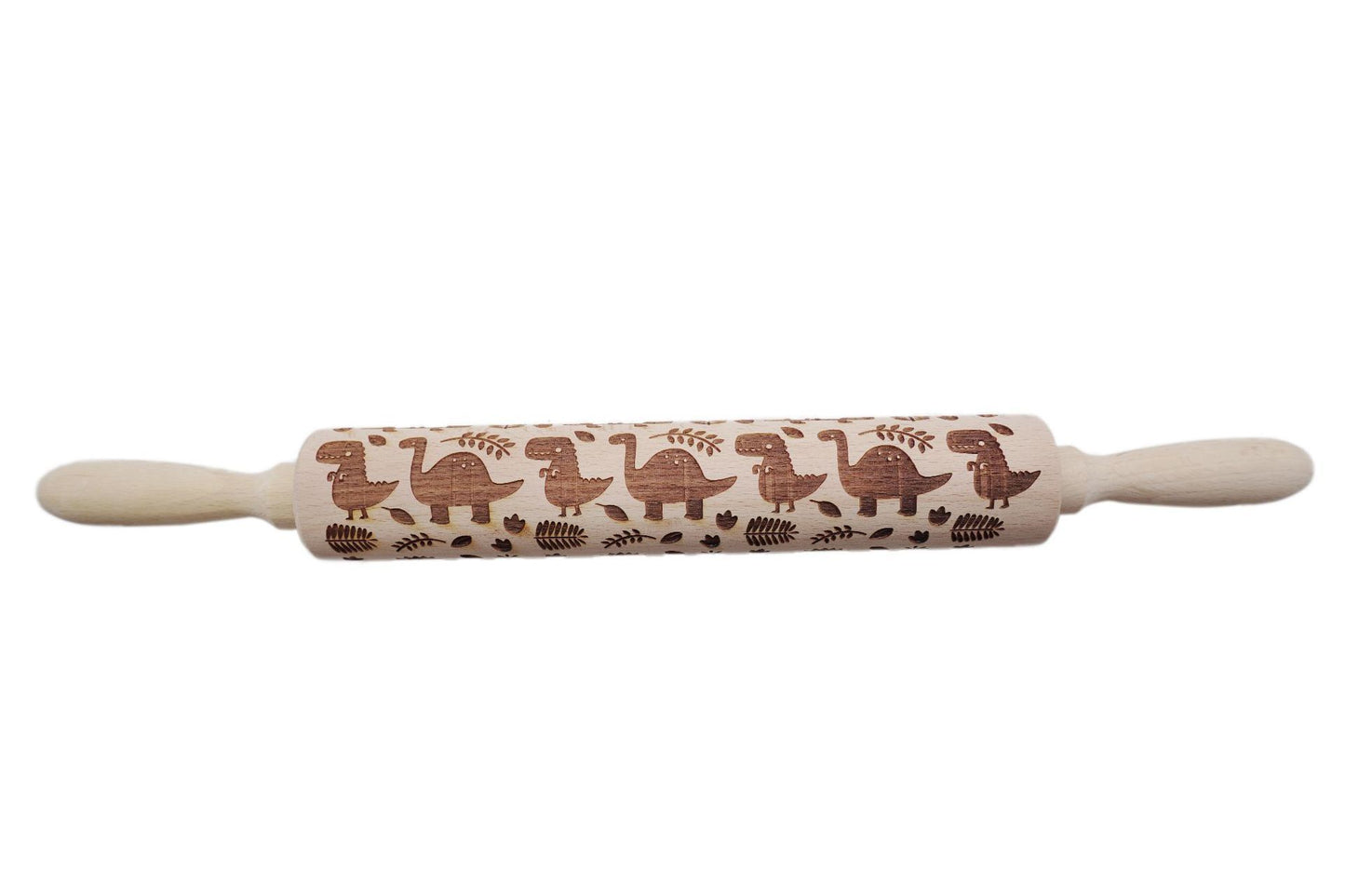Wooden rolling pin with turtle design on a white background