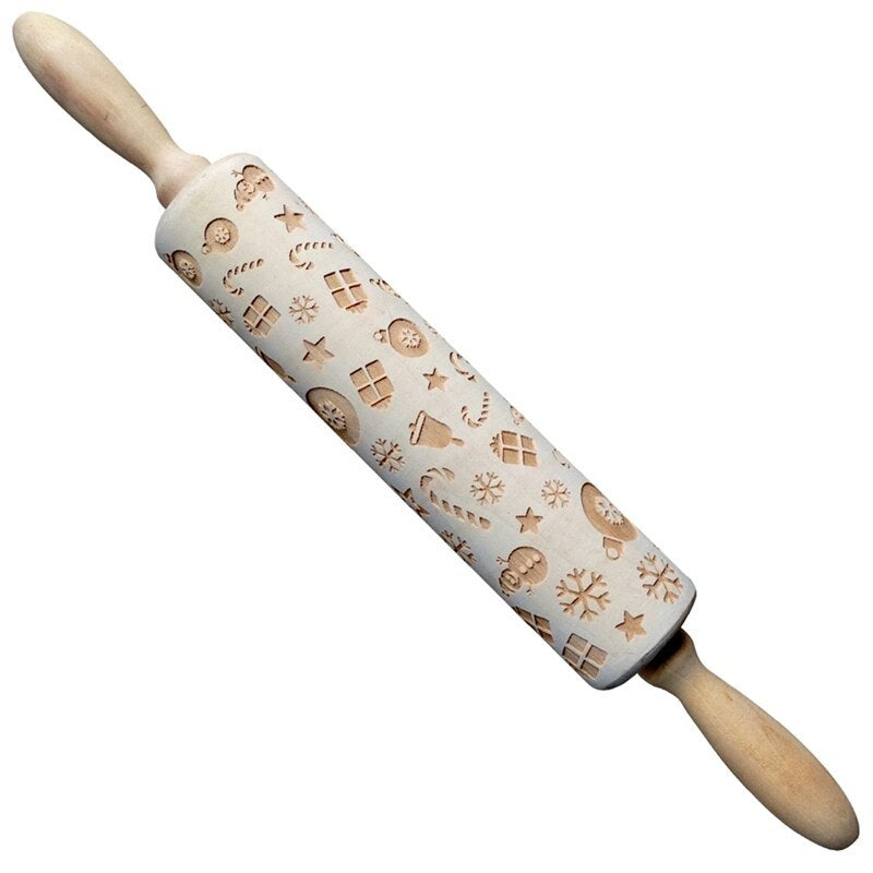 Decorative rolling pin with Christmas-themed patterns on a white background