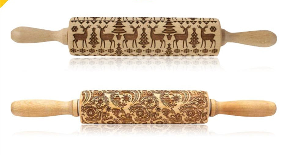 Two wooden rolling pins with engraved patterns on a white background