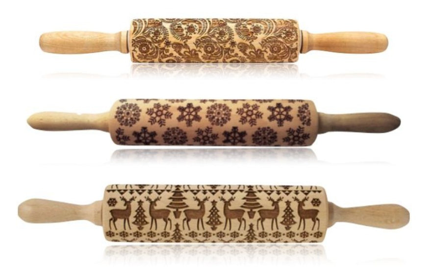 Three wooden rolling pins with embossed patterns on a white background
