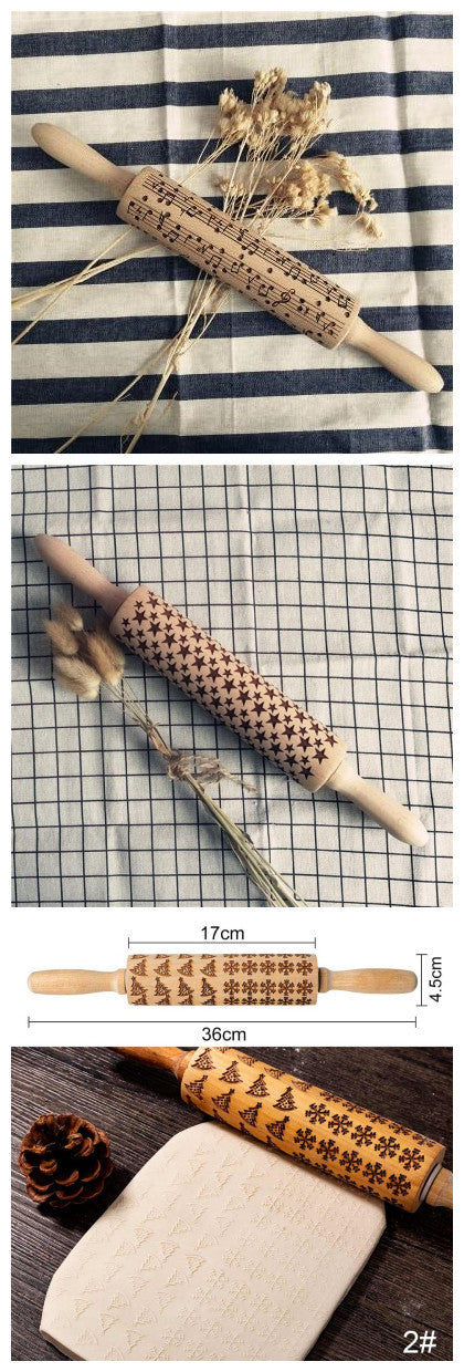 Decorative rolling pin with engraved patterns on a striped fabric, grid, and wooden surface.