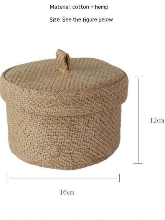 Woven storage basket with lid and dimensions on a white background