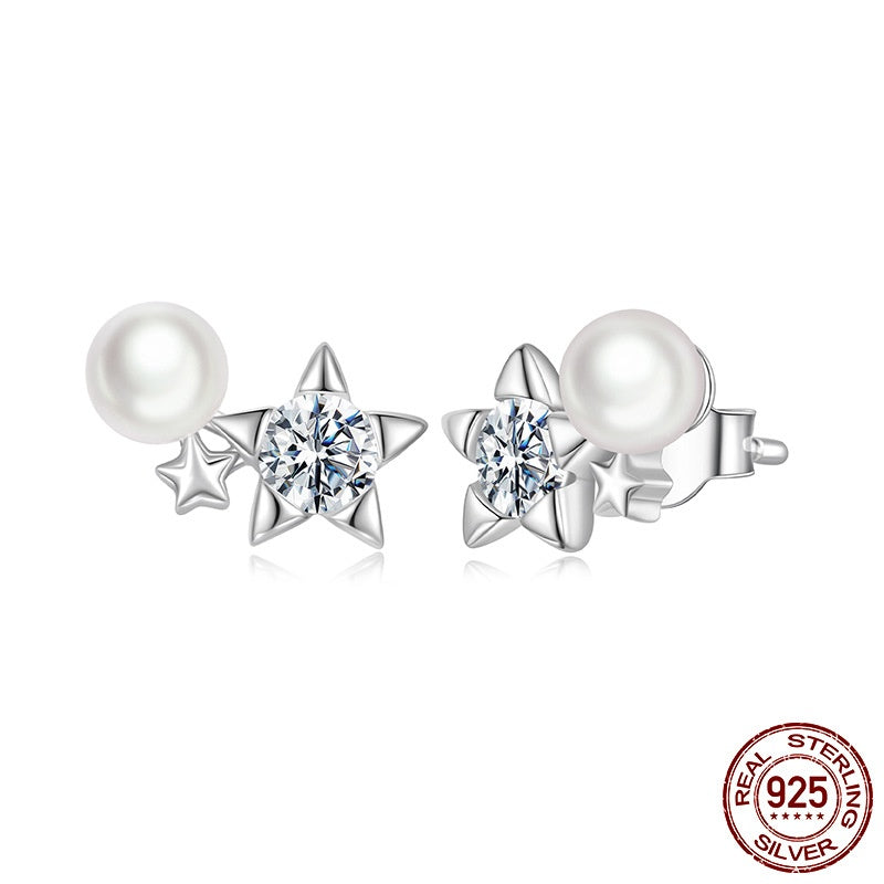 Silver earrings with pearls and star-shaped crystals on a white background, featuring a 'Real Sterling Silver 925' stamp.