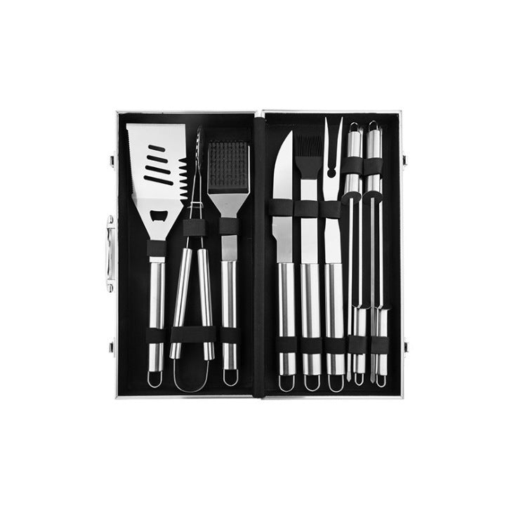 Set of barbecue tools in a black box on a white background