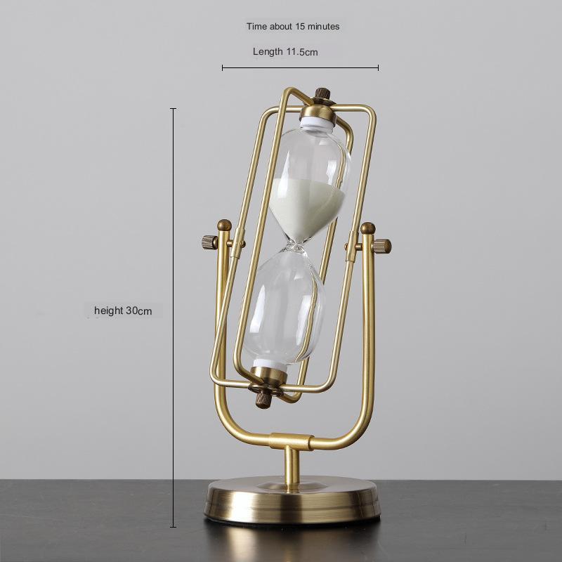 Gold hourglass with measurements on a gray background
