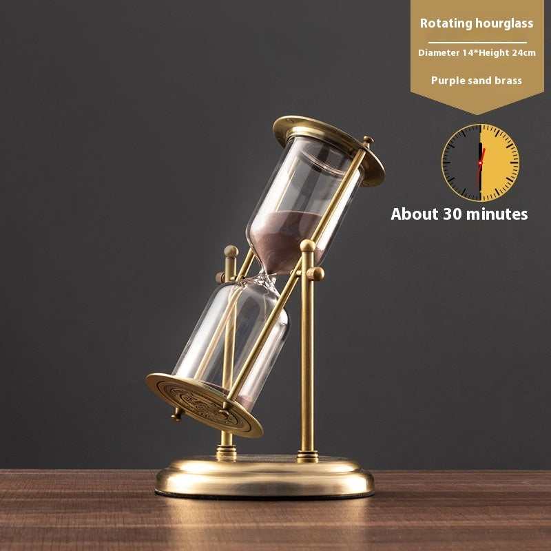 Rotating hourglass with purple sand on a wooden base against a dark 