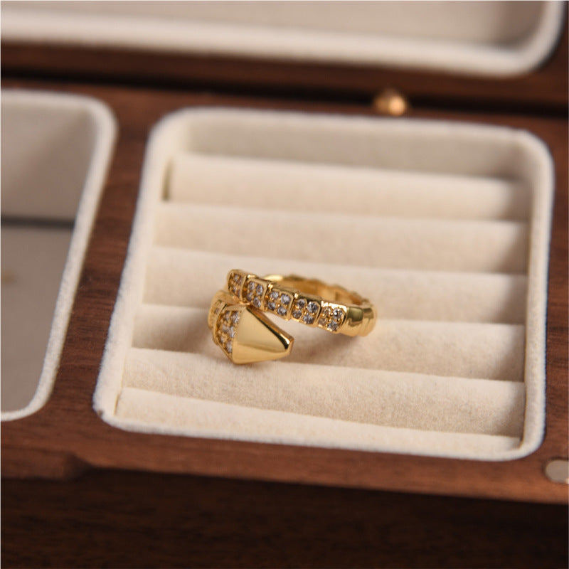 Gold ring with diamonds in a jewelry box