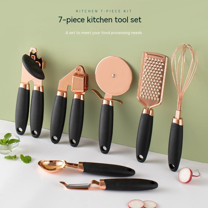 7-piece kitchen tool set with rose gold and black handles on a white surface with a green background.