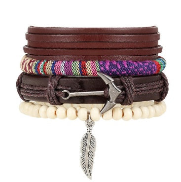 Multistrand bracelet with leather, beads, and feather charm on a white background