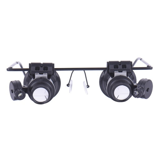Front view of jeweler glasses on a white background