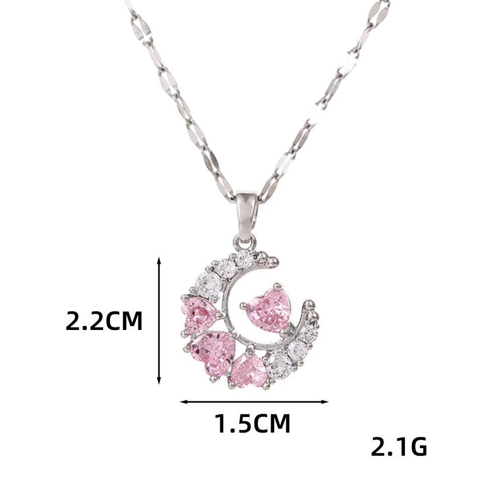 Necklace with pink heart-shaped pendant and measurements on a white background