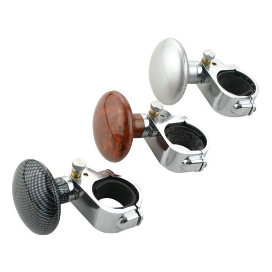 “Universal steering wheel spinner knobs in black texture, white, and wood-grain with stainless clamp”